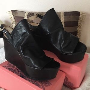 Steve Madden black platform shoes.